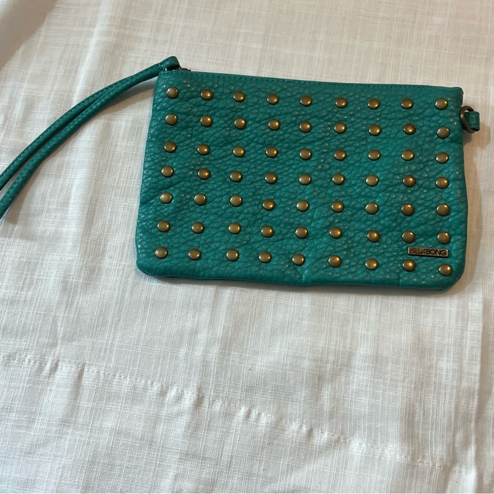 Billabong wrist wallet  Turquoise with metal accents. Lightweight